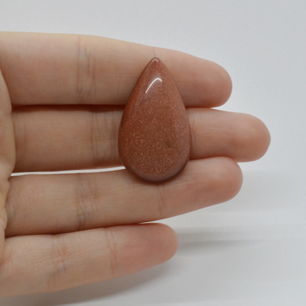 Cabochon goldstone maro 33x20x6mm c48