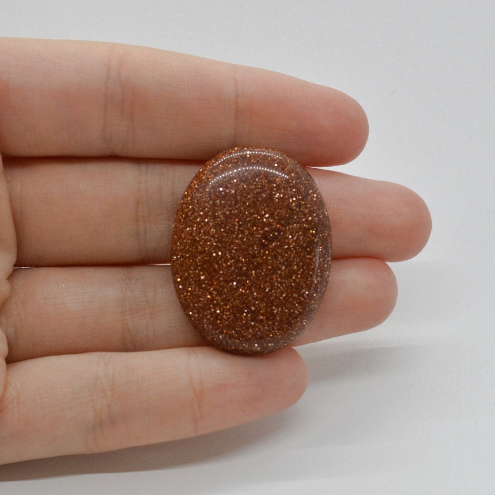 Cabochon goldstone maro 33x26x6mm c116