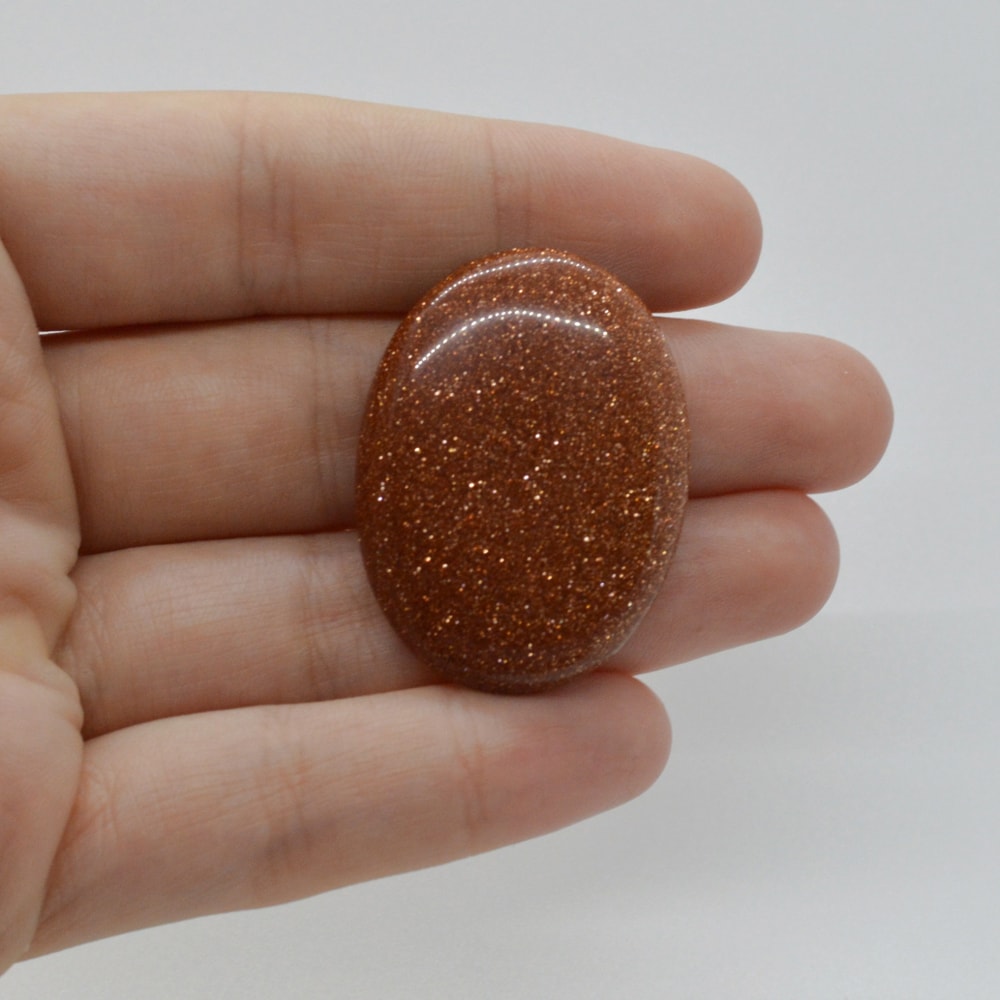 Cabochon goldstone maro 36x27x5mm c79