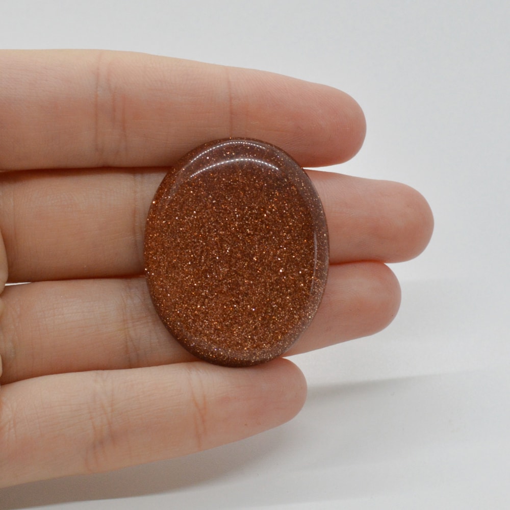 Cabochon goldstone maro 36x29x6mm c130