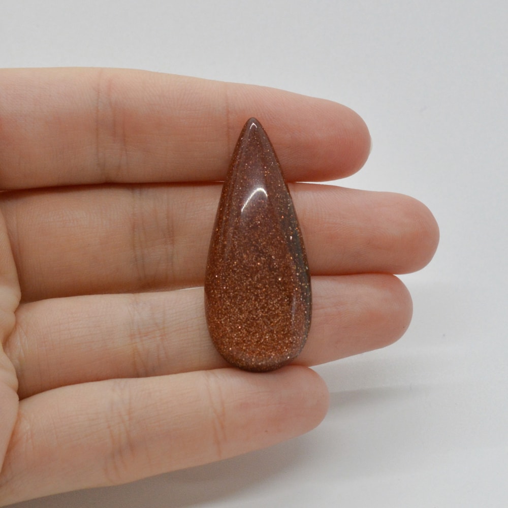 Cabochon goldstone maro 40x16x6mm c117