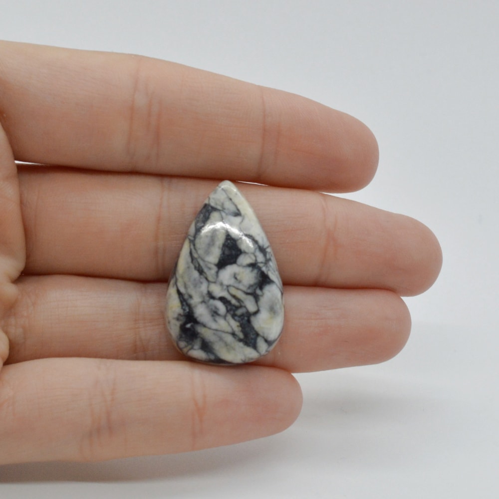 Cabochon pinolith 29x19x6mm c60